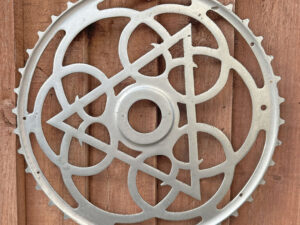 LOT 11 1900s INCH PITCH NICKEL MOTOR-PACING CHAINWHEEL